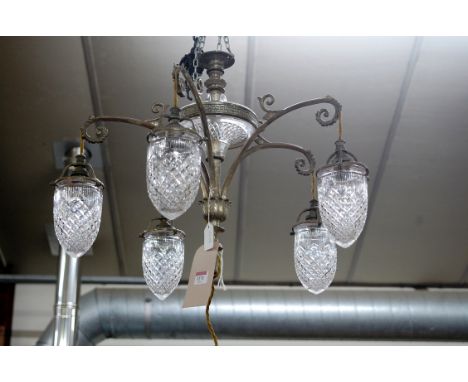 An Art Nouveau steel and cut glass hanging five light electrolier having floral scroll branches   Condition Report / Extra In