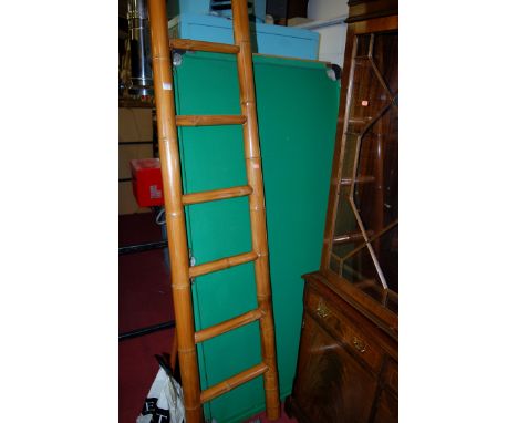 A bamboo library ladder, together with a small size snooker table with cues, balls, and accessories