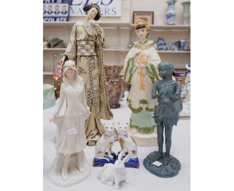 A simulated ivory Geisha girl; 2 ceramic figures; a pair of Staffordshire cats; a fairy and a rabbit