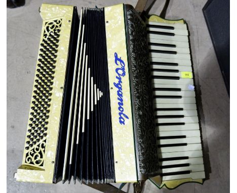 A Lorganola 120 base piano accordion with case