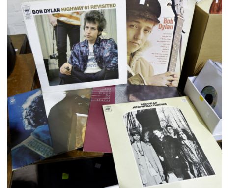 Eight Bob Dylan LP records: Bob Dylan, Bringing It All Back Home, Highway 61 Revisited, Blood on the Tracks, Greatest Hits, M