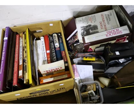 A selection of hard back and paperback books about Sherlock Holmes and Arthur Conan Doyle and collectables