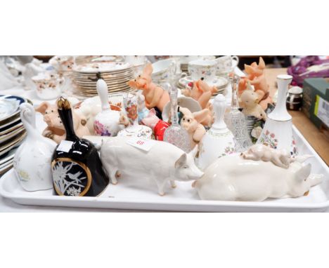 A BESWICK figure of a pig CH Wallboy 53, another Beswick pig and a selection of china bells, composition figures