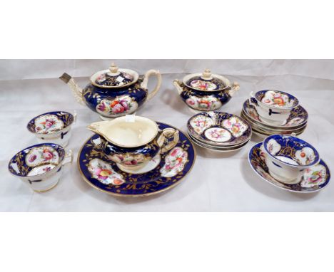 A 19th century English bone china tea service with hand enamelled floral decoration in gilt decorated blue ground comprising 