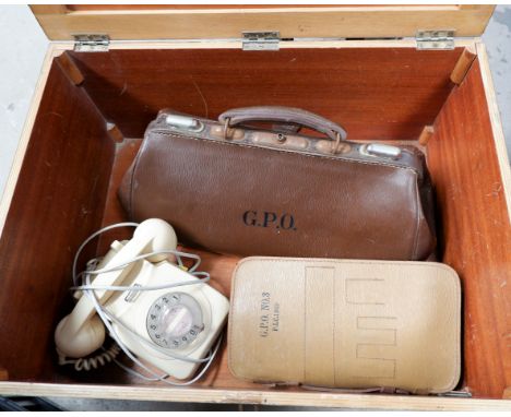 A GPO leather holdall, a GPO leather tool kit holder; a vintage cream telephone 8746G all in wooden carrying box