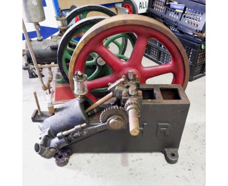 A vintage style cylinder internal combustion stationary engine with 17'' flywheel