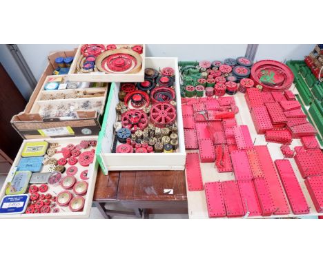 A VERY large collection of Meccano pieces organised by size, shape, use, etc including wheels, tools, screws, joints etc