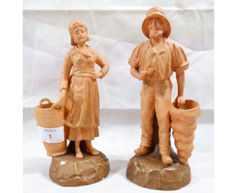 A pair of Turn Wein porcelain figures: fisherman and wife, in muted browns and gilt (slight chips to base of man