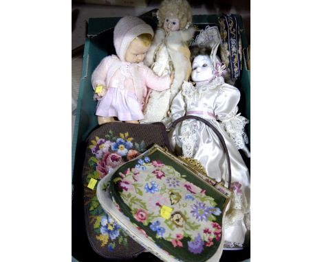 A 1930's composition baby doll; 2 Victorian style dolls and a selection of tapestry work, handbags and purses