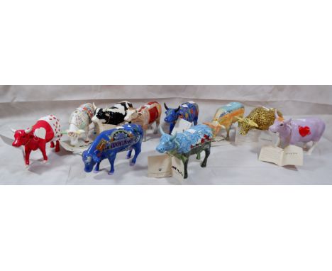 Ten originally boxed Cow Parade figures including Udderly Groovy Lady Bell Bennet etc