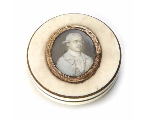 A George III ivory patch box with miniature portrait of a gentleman. 7.5cm diameter. Condition report: see terms and conditio