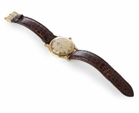A gent's vintage Omega Constellation 18ct gold watch on a later leather strap. Round steel dial, arrow applied batons, centre