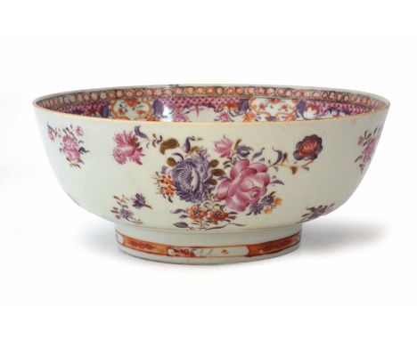 Chinese export porcelain bowl, painted with pink scale borders and pink and puce floral sprays, late 18th century, 26cm diame