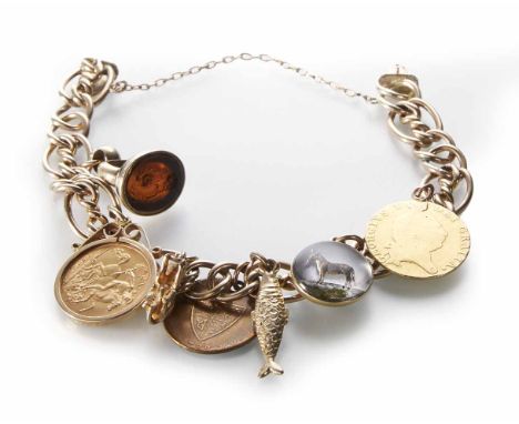 A Victorian 9ct gold charm bracelet with seventeen charms, comprising a 1798 shield back half guinea, a 1914 half sovereign, 