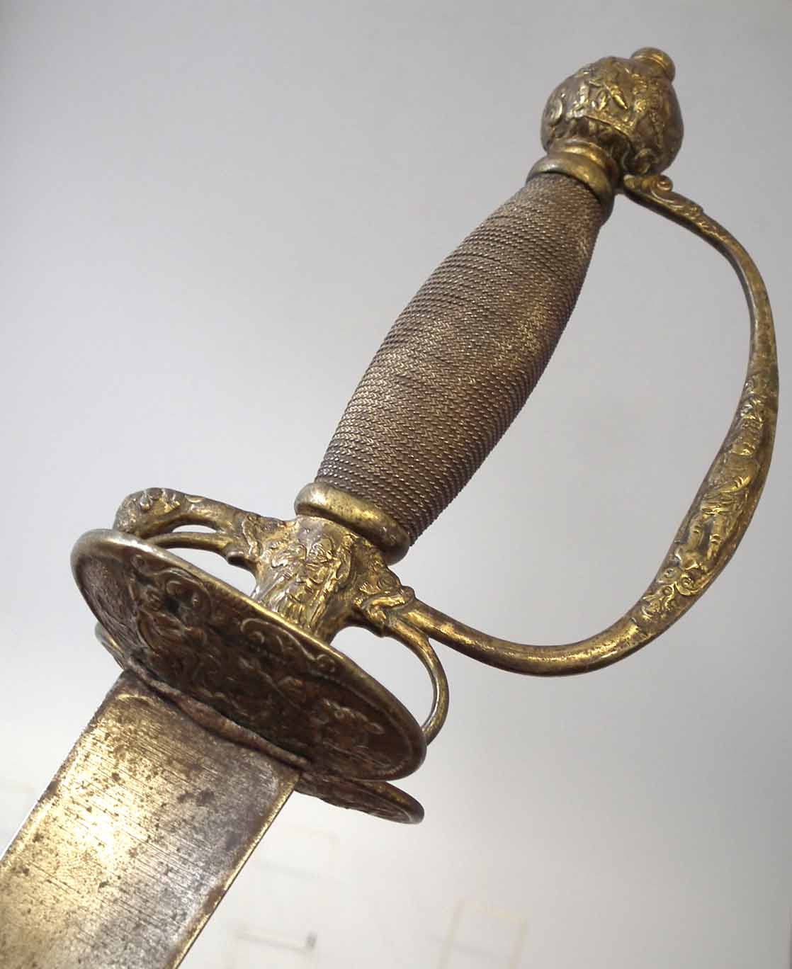 Court sword, with triangular form rapier blade and brass guard embossed ...