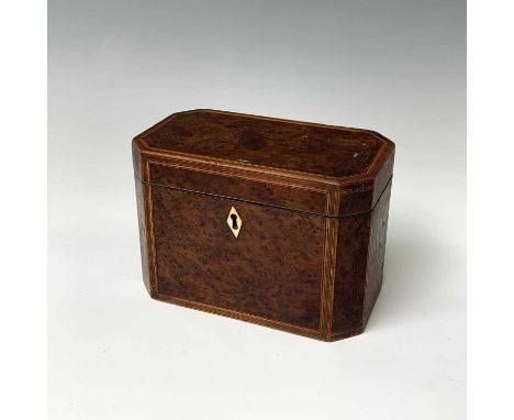 An inlaid burr walnut tea caddy, early 19th century, height 12.5cm, width 18.5cm, depth 10.5cm.Condition report: A section of