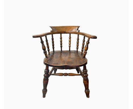 An ash and beech smokers bow armchair, stamped Drake &amp; Dean 1940, M8' with ministry crows foot, height 77.5cm, width 68cm