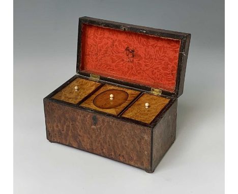 A George IV burr walnut tea caddy, with a satinwood interior, height 15.5cm, width 29cm, depth 15cm.Provenance:Michael Trethe