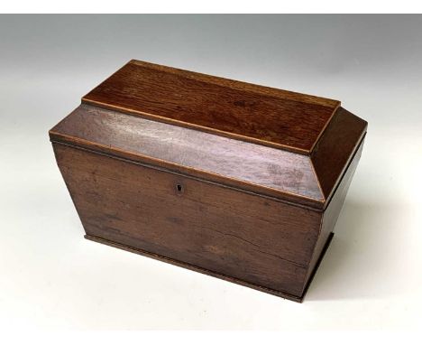 A Regency pheasantwood veneered tea caddy, the central glass mixxing bowl flanked by hingeed compartments, height 20cm, width