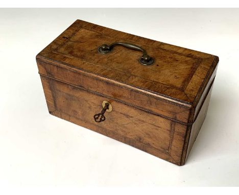 A George II walnut cross and feather banded tea caddy, with brass handle to the cover, height 13cm, width 25.5cm, depth 12.5c
