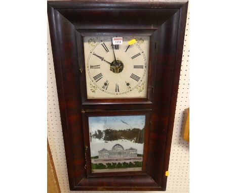 An early 20th century American mahogany drop trunk wall clock, having two weights and pendulum
