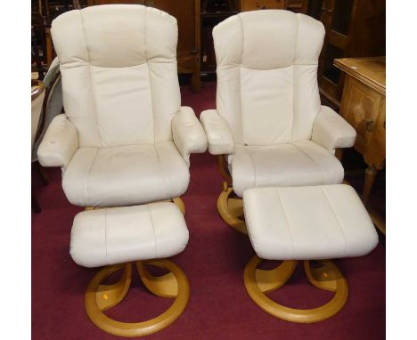 A pair of contemporary cream leather upholstered and formed laminate framed swivel revolving armchairs, w.82cm, each with a m