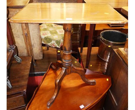 A Victorian mahogany round cornered tilt-top pedestal tripod occasional table, length 62.5cm