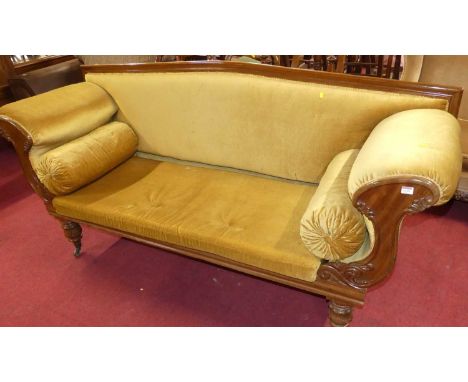 A mid-Victorian mahogany three-seater scroll end sofa, mustard dralon upholstered, with squab seat cushion and rolled end cus