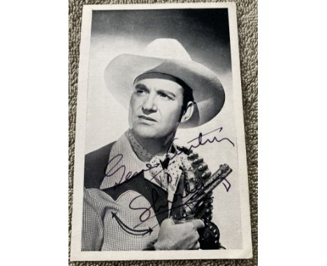 Gene Autry signed 6 x 4 inch vintage portrait photo in Western outfit, to Shirley. Nicknamed the Singing Cowboy, was an Ameri