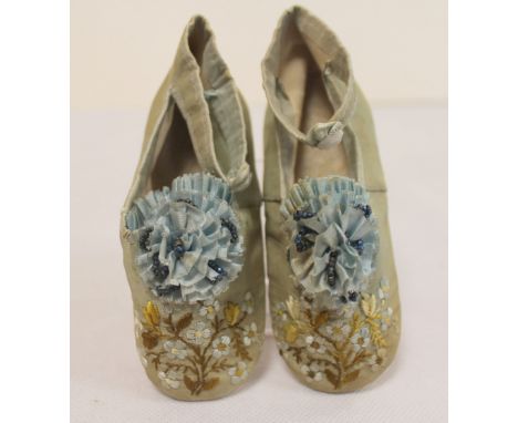 Pair of Georgian silk babies shoes in pale sage green grosgrain with floral embroidery, pale blue beaded ruffle pompom, butto