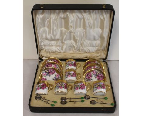 1930's cased floral coffee cans and saucers for six with bean finial silver coffee spoons.