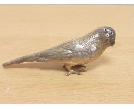 Silver pepperette modelled as a parakeet with glass eyes by Walker & Hall Sheffield 1899. 11cm. 2½oz.   Condition Report. Mak