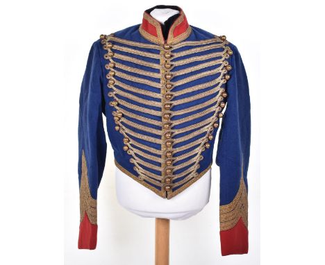 Late 19th Century European Hussar Type Tunic, being a short stable pattern in blue wool with red facings. Gilt braid decorati