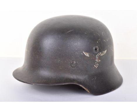 WW2 German Luftwaffe Steel Combat Helmet, being a M-40 steel helmet shell with Luftwaffe eagle decal to the side. Much of the