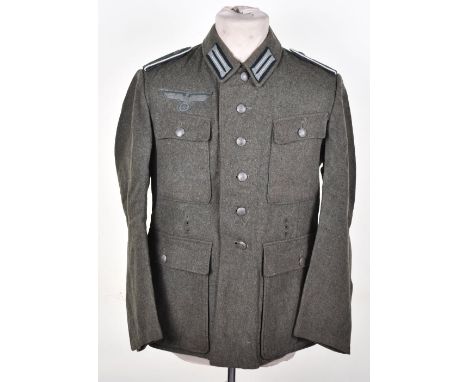 WW2 German M-43 Combat Tunic, fine example of the four pocket German army combat tunic with non-pleated pockets. Tunic is com