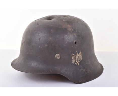 WW2 German Army M-42 Steel Combat Helmet, good untouched example which retains its original single German army decal. Much of