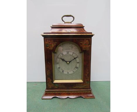 An early 20th Century walnut mantel clock with painted Oriental design, silvered dial, French movement, 24cm high