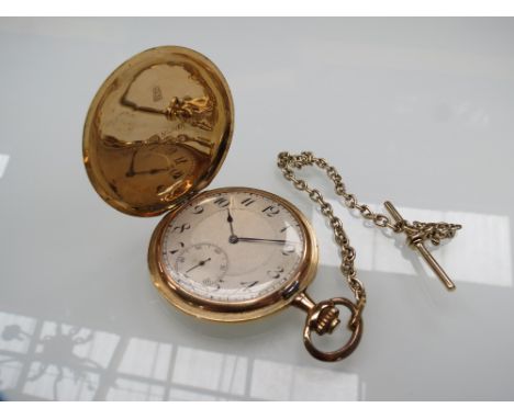 An 18ct gold hunter pocket watch, Arabic silvered and engine turned dial with subsidiary seconds dial, keyless wind, circa 19
