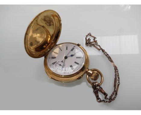 An early 20th Century 18K full hunter pocket watch with Roman enamel dial with subsidiary second dial, chronograph and quarte
