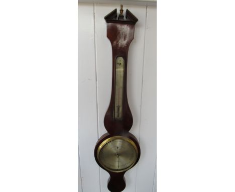 A Victorian mahogany wheel barometer with long moulded thermometer box, signed Lionel Somalvico, 125 Holburn Hill, London 