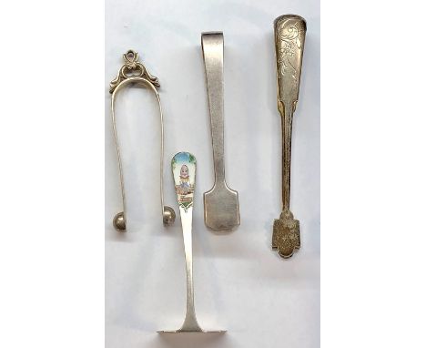 4 silver items includes 3 silver sugar tongues and enamel feeding spoon Scottish and Russian silver hallmarks on 2 of the sug