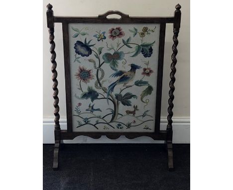 Oak barley twist needle work fire screen, approx measurements height 104cm, width 60cm, depth of feet 42cm