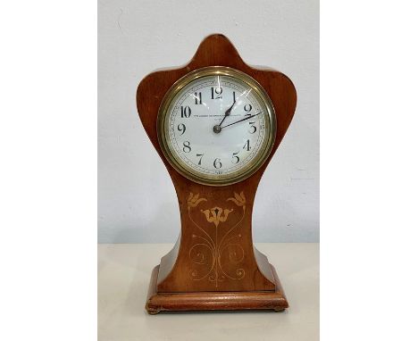 Victorian mahogany inlaid balloon mantle clock by the London manufacturing Goldsmiths Co Ltd measures approx 25cm tall
