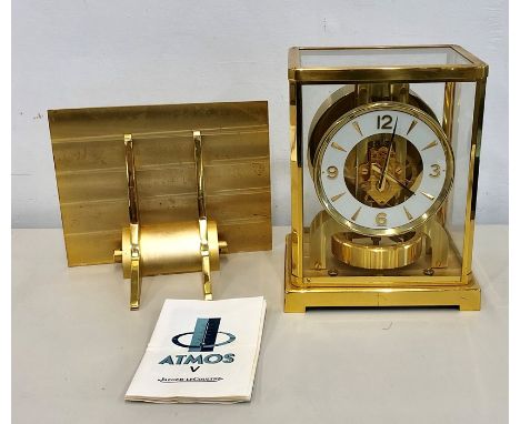 Jaeger le Coultre Atmos clock and bracket in working order but no warranty given with booklet 