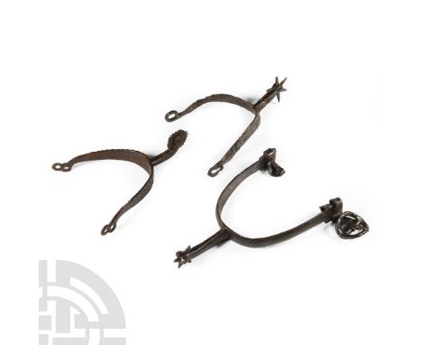 Circa 13th-17th century A.D.. Comprising: a rowel spur of early 13th century date with short neck; a 14th century U-shaped ro