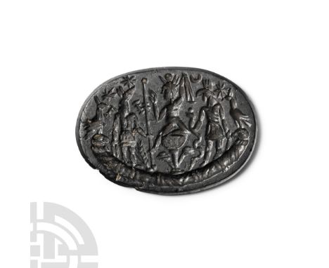2nd-5th century A.D.. Ellipsoid plaque with chamfered rim; obverse: two animal-headed attendants flank a seated figure in pro