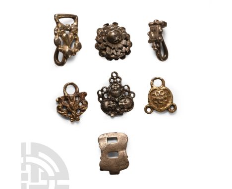 Circa 16th century A.D.. Including composite rosette button, openwork hooked tag and other types; many of these objects are p