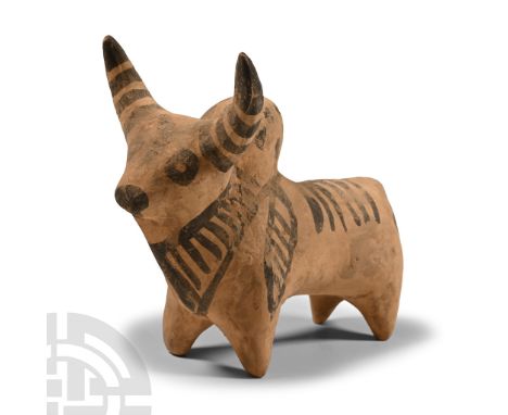 20th century A.D.. Ceramic zebu with painted markings, hole to the underside; after the antique.  246 grams, 12.7 cm (5 in.).