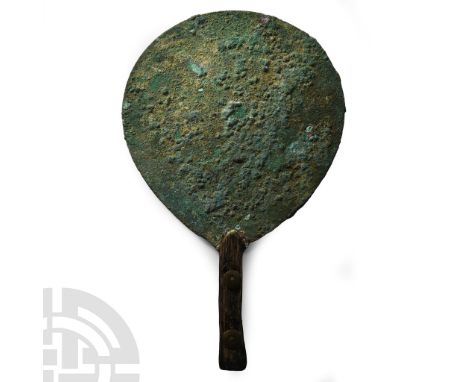 1st-2nd century A.D.. Flat piriform plate with replacement handle.  115 grams, 17.7 cm (6 7/8 in.). From the collection of th