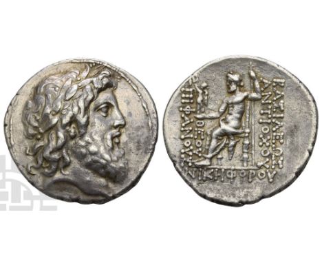 175-164 BC.. Laureate and bearded head of Zeus to right / BA?I?E?? ANTIOXOY ?EOY E?I?ANOY? NIKH?OPOY, Zeus seated to left on 